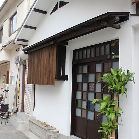 Tenma Itoya Guest House Osaka Bagian luar foto