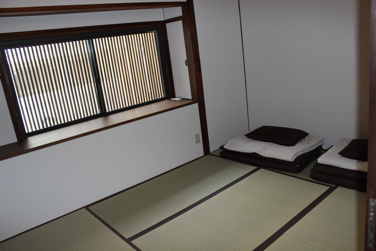 Tenma Itoya Guest House Osaka Ruang foto